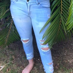 light denim ripped jeans.